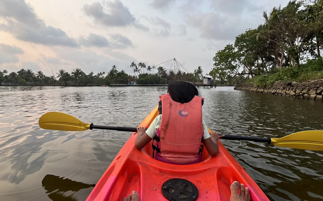 Sunset kayaking near Chinese fishing nets in Kochi backwaters