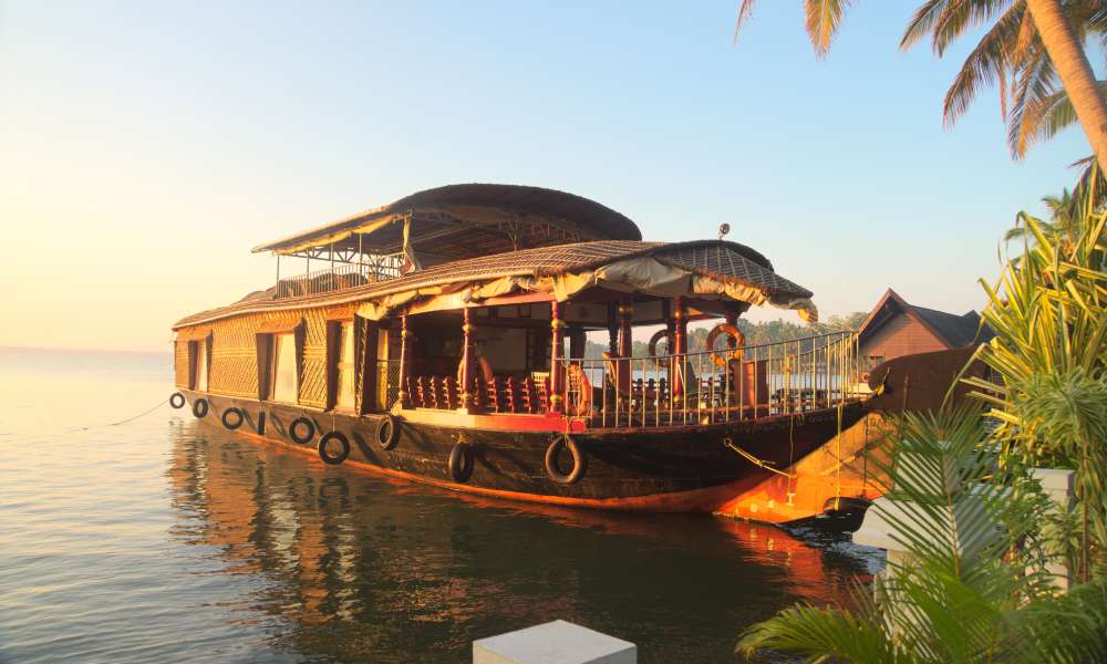 Backwater Feast Silhouettes of people in boat at sunset. Man and woman ride boat on river. Small family trip